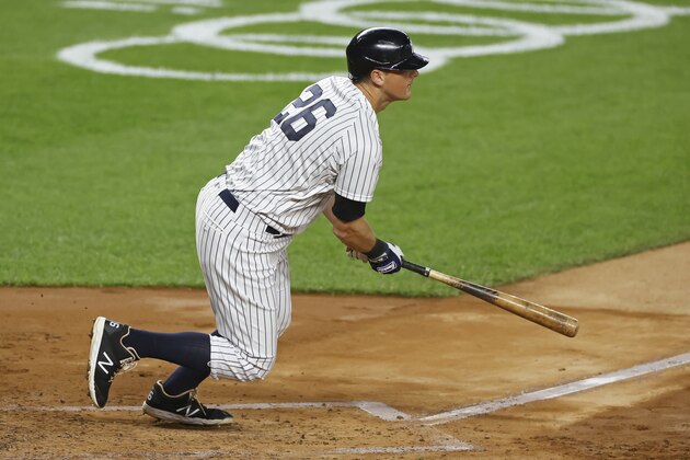 New York Yankees' DJ LeMahieu hits an RBI single during the second inning of a baseball game against the Toronto Blue Jays on Tuesday, Sept. 15, 2020, in New York. (AP Photo/Adam Hunger)