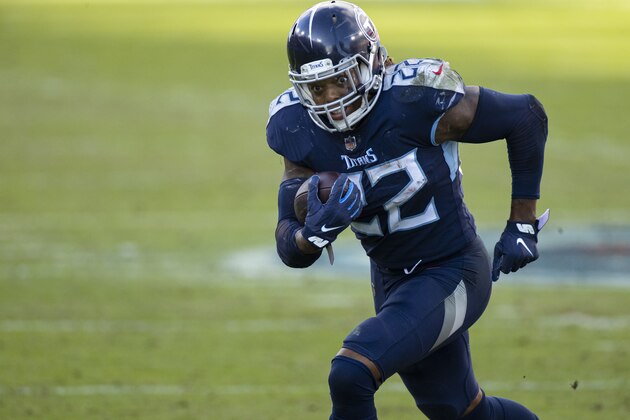 Tennessee Titans running back Derrick Henry (22) runs with the ball against the Detroit Lions during the fourth quarter of an NFL football game, Sunday, Dec. 20, 2020, in Nashville, Tenn. (AP Photo/Brett Carlsen)