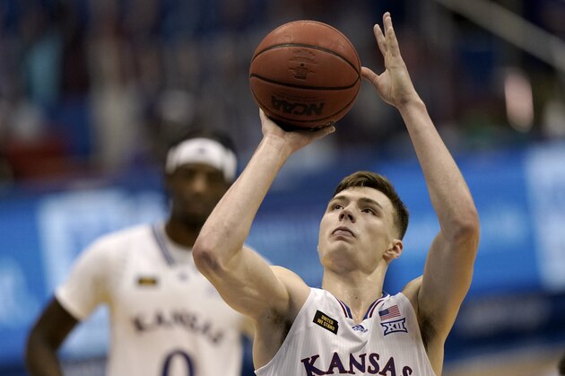Kansas' Christian Braun shoots during the second half of an NCAA college basketball game against North Dakota State Saturday, Dec. 5, 2020, in Lawrence, Kan. Kansas won 65-61. (AP Photo/Charlie Riedel)