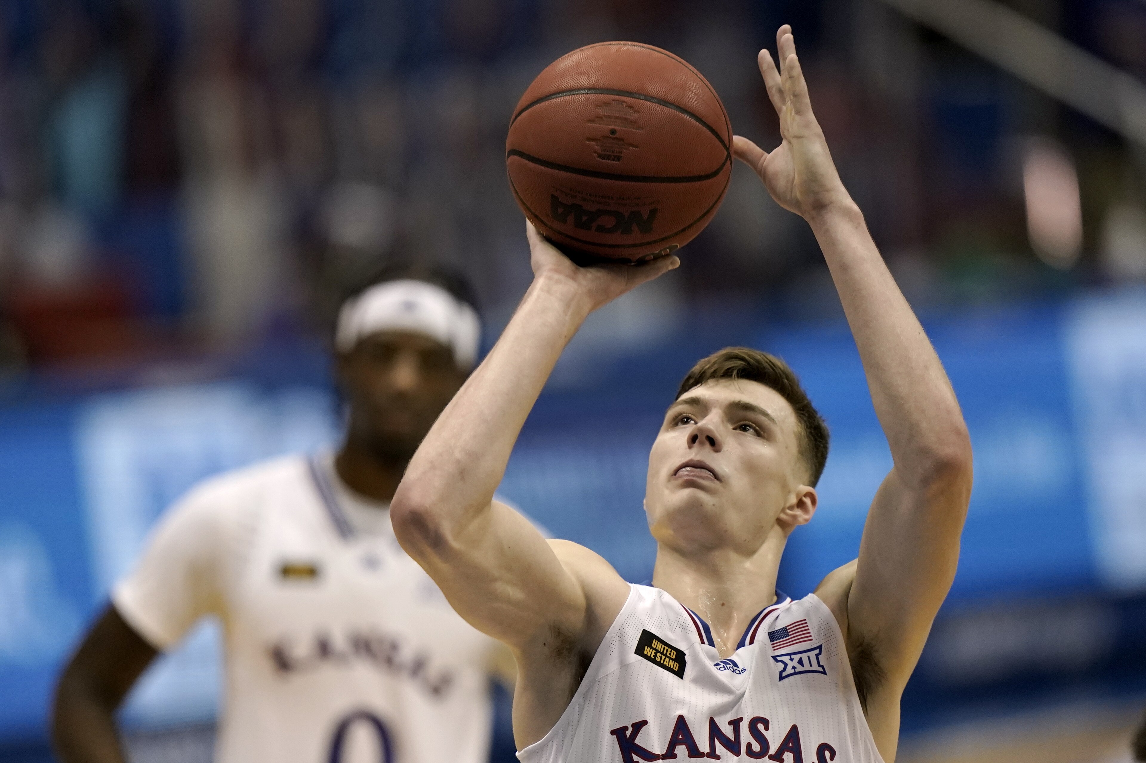 Kansas' Christian Braun shoots during the second half of an NCAA college basketball game against North Dakota State Saturday, Dec. 5, 2020, in Lawrence, Kan. Kansas won 65-61. (AP Photo/Charlie Riedel)