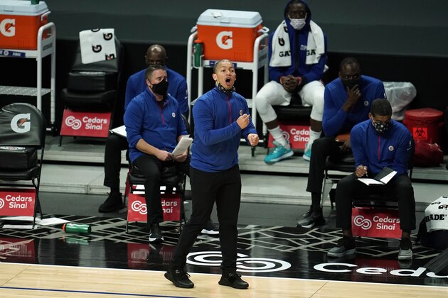 Los Angeles Clippers head coach Tyronn Lue yells from the bench during the first half of an NBA preseason basketball game against the Utah Jazz Thursday, Dec. 17, 2020, in Los Angeles. (AP Photo/Marcio Jose Sanchez)