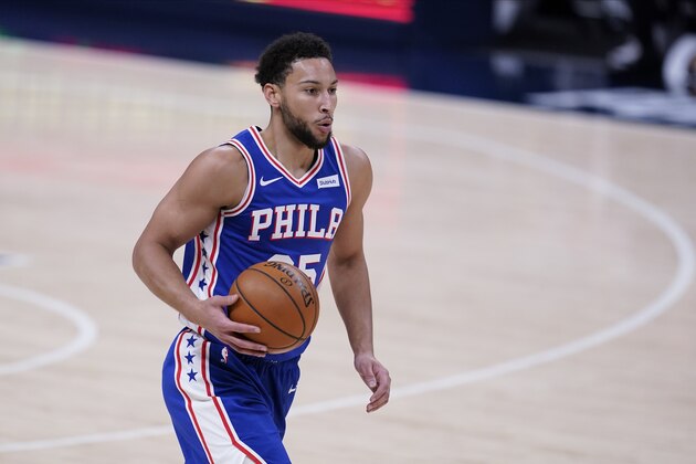 Philadelphia 76ers' Ben Simmons (25) dribbles during the first half of an NBA basketball game against the Indiana Pacers, Friday, Dec. 18, 2020, in Indianapolis. (AP Photo/Darron Cummings)