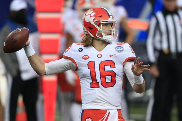 Clemson quarterback Trevor Lawrence (16) looks for a receiver during the first half of the Atlantic Coast Conference championship NCAA college football game against Notre Dame, Saturday, Dec. 19, 2020, in Charlotte, N.C. (AP Photo/Brian Blanco)