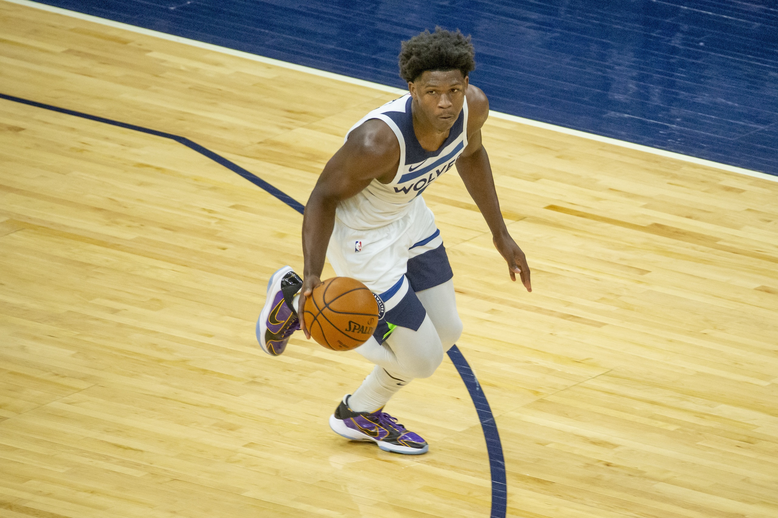 Minnesota Timberwolves guard Anthony Edwards (1) brings the ball up court against the Memphis Grizzlies during a preseason NBA basketball game Monday, Dec. 14, 2020, in Minneapolis. The Grizzlies won 123-104. (AP Photo/Bruce Kluckhohn)