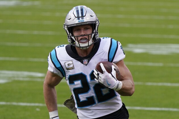 Carolina Panthers running back Christian McCaffrey runs with the ball during an NFL football game against the Kansas City Chiefs Sunday, Nov. 8, 2020, in Kansas City, Mo. (AP Photo/Jeff Roberson)