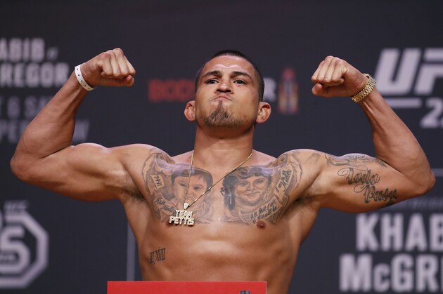 Anthony Pettis poses during a ceremonial weigh-in for the UFC 229 mixed martial arts fight Friday, Oct. 5, 2018, in Las Vegas. Pettis is scheduled to fight Tony Ferguson Saturday in Las Vegas. (AP Photo/John Locher)