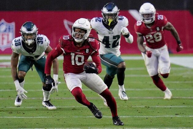 Arizona Cardinals wide receiver DeAndre Hopkins (10) runs after the catch as Philadelphia Eagles safety K'Von Wallace (42) pursues during the second half of an NFL football game, Sunday, Dec. 20, 2020, in Glendale, Ariz. (AP Photo/Ross D. Franklin)