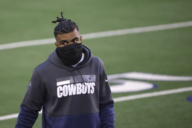 Dallas Cowboys running back Ezekiel Elliott (21) looks on against the San Francisco 49ers during an NFL football game in Arlington, Texas, Sunday, Dec.20, 2020. (AP Photo/Ron Jenkins) Dallas Cowboys running back Ezekiel Elliott (21) looks on against the San Francisco 49ers during an NFL football game in Arlington, Texas, Sunday, Dec.20, 2020. (AP Photo/Ron Jenkins)