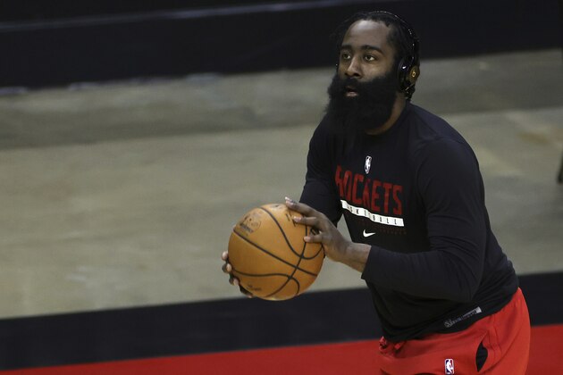 Houston Rockets' James Harden warms up prior to facing the San Antonio Spurs in an NBA basketball game in Houston, Thursday, Dec. 17, 2020. (Carmen Mandato/Pool Photo via AP)