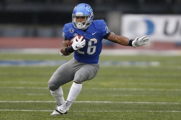 Buffalo running back Jaret Patterson carries the ball during the first half of the team's NCAA college football game against Akron in Amherst, N.Y., Saturday Dec. 12, 2020. (AP Photo/Jeffrey T. Barnes)
