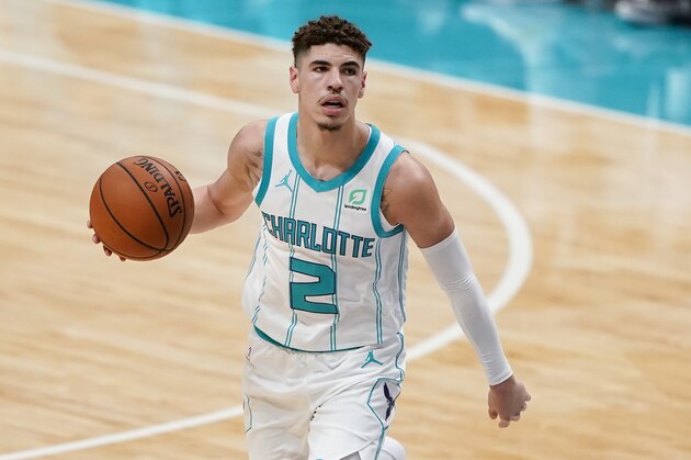 Charlotte Hornets guard LaMelo Ball plays against the Toronto Raptors during the second half of an NBA preseason basketball game in Charlotte, N.C. on Saturday, Dec. 12, 2020. (AP Photo/Chris Carlson)