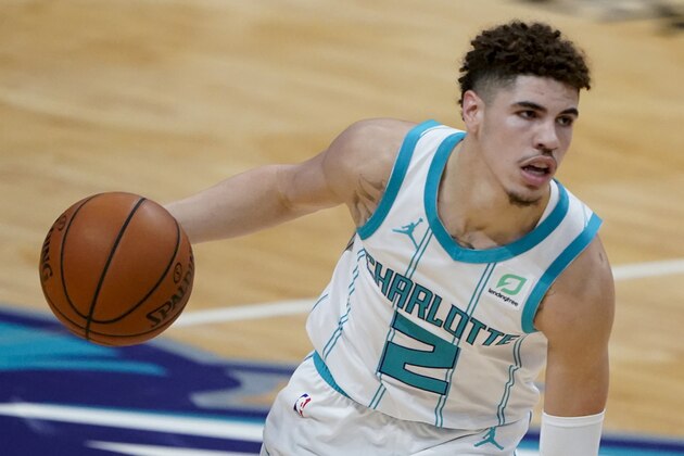 Charlotte Hornets guard LaMelo Ball plays against the Toronto Raptors during the second half of an NBA preseason basketball game in Charlotte, Monday, Dec. 14, 2020. (AP Photo/Chris Carlson)
