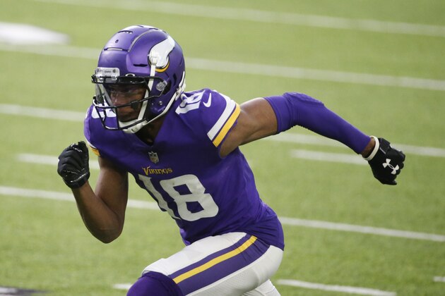 Minnesota Vikings wide receiver Justin Jefferson runs up field during the second half of an NFL football game against the Chicago Bears, Sunday, Dec. 20, 2020, in Minneapolis. (AP Photo/Bruce Kluckhohn)