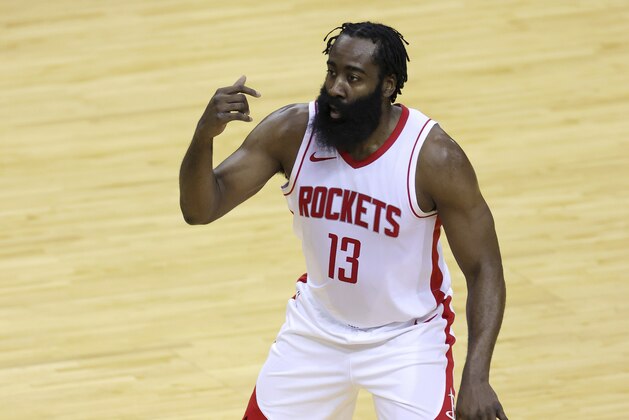 Houston Rockets' James Harden controls the ball during the first quarter of an NBA basketball game against the San Antonio Spurs in Houston, Thursday, Dec. 17, 2020. (Carmen Mandato/Pool Photo via AP)
