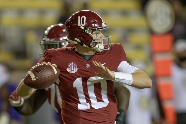 Alabama quarterback Mac Jones (10) throws during the first half of an NCAA college football game against LSU in Baton Rouge, La., Saturday, Dec. 5, 2020. (AP Photo/Matthew Hinton)
