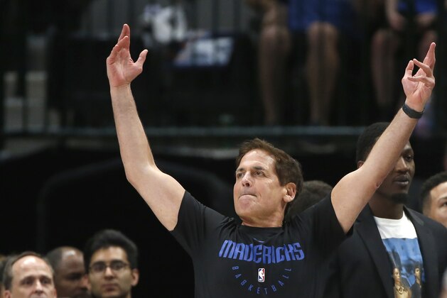 Dallas Mavericks owner Mark Cuban looks on as the Mavericks play the Denver Nuggets during the second half of an NBA basketball game, Wednesday, March 11, 2020, in Dallas. The Mavericks won 113-97. (AP Photo/Ron Jenkins)