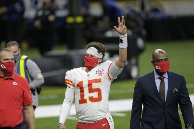 Kansas City Chiefs quarterback Patrick Mahomes (15) waves as he walks off the field after an NFL football game against the New Orleans Saints in New Orleans, Sunday, Dec. 20, 2020. The Chiefs won 32-29. (AP Photo/Brett Duke)