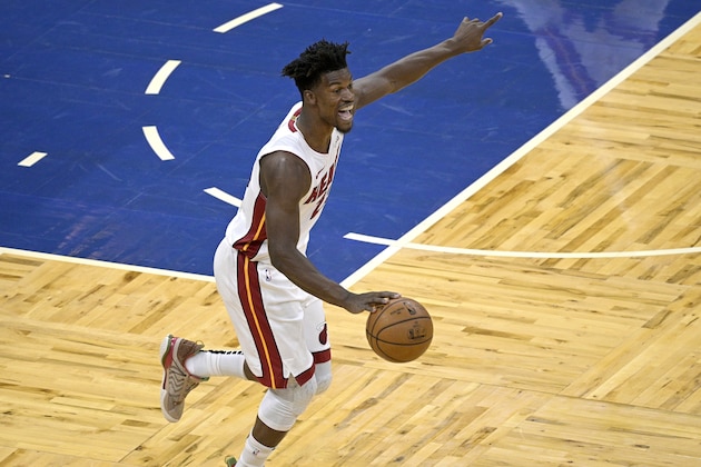 Miami Heat forward Jimmy Butler directs a play during the first half of the team's NBA basketball game against the Orlando Magic, Wednesday, Dec. 23, 2020, in Orlando, Fla. (AP Photo/Phelan M. Ebenhack) Miami Heat forward Jimmy Butler directs a play during the first half of the team's NBA basketball game against the Orlando Magic, Wednesday, Dec. 23, 2020, in Orlando, Fla. (AP Photo/Phelan M. Ebenhack)