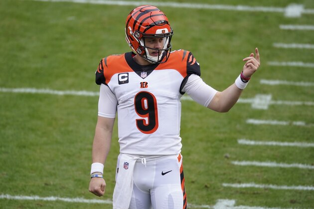 Cincinnati Bengals quarterback Joe Burrow (9) points to the team bench during the first half of an NFL football game against the Washington Football Team, Sunday, Nov. 22, 2020, in Landover, Md. (AP Photo/Al Drago)