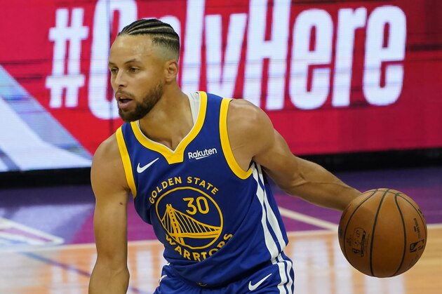 Golden State Warriors guard Stephen Curry during the first half of an NBA preseason basketball game against the Sacramento Kings in Sacramento, Calif., Thursday, Dec. 17, 2020. The Warriors won 113-109.(AP Photo/Rich Pedroncelli)