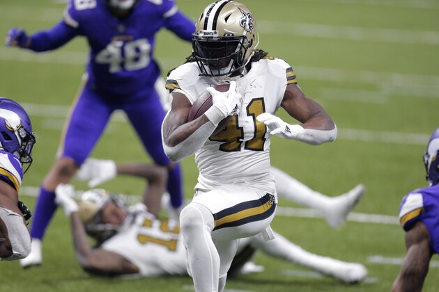 New Orleans Saints running back Alvin Kamara (41) carries for his fourth touchdown of the game, in the second half of an NFL football game against the Minnesota Vikings in New Orleans, Friday, Dec. 25, 2020. (AP Photo/Brett Duke)