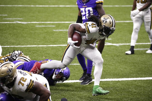 New Orleans Saints running back Alvin Kamara (41) crosses into the end zone for his fifth touchdown of the game, in the second half of an NFL football game against the Minnesota Vikings54 in New Orleans, Friday, Dec. 25, 2020. (AP Photo/Butch Dill)