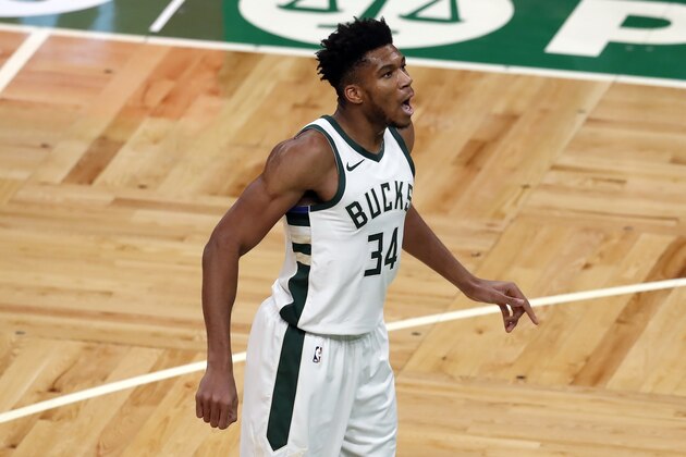 Milwaukee Bucks' Giannis Antetokounmpo plays against the Boston Celtics during the second half of an NBA basketball game, Wednesday, Dec. 23, 2020, in Boston. (AP Photo/Michael Dwyer)
