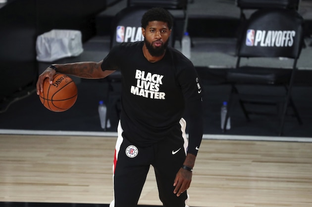 Los Angeles Clippers guard Paul George warms up for Game 5 of an NBA basketball first-round playoff series against the Dallas Mavericks, Tuesday, Aug. 25, 2020, in Lake Buena Vista, Fla. (Kim Klement/Pool Photo via AP) Los Angeles Clippers guard Paul George warms up for Game 5 of an NBA basketball first-round playoff series against the Dallas Mavericks, Tuesday, Aug. 25, 2020, in Lake Buena Vista, Fla. (Kim Klement/Pool Photo via AP)