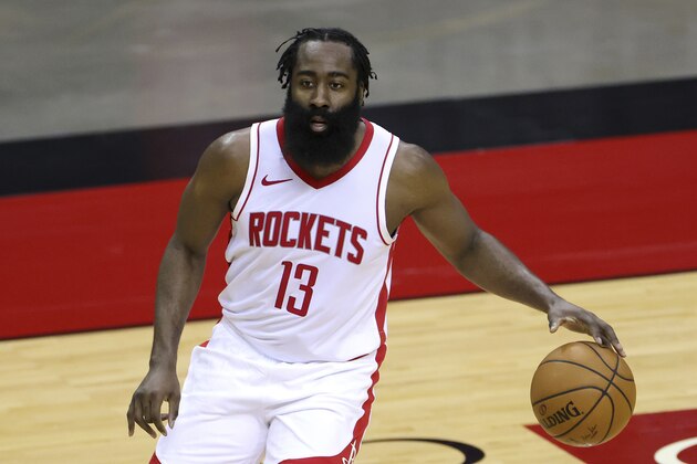 Houston Rockets' James Harden controls the ball during the first half of an NBA basketball game against the San Antonio Spurs in Houston, Thursday, Dec. 17, 2020. (Carmen Mandato/Pool Photo via AP)