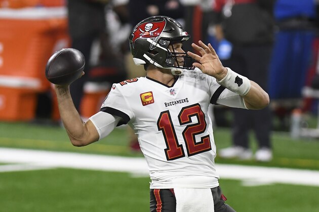 Tampa Bay Buccaneers quarterback Tom Brady throws during pregame of an NFL football game against the Detroit Lions, Saturday, Dec. 26, 2020, in Detroit. (AP Photo/Lon Horwedel)