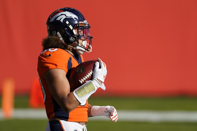 Denver Broncos running back Phillip Lindsay warms up against the New Orleans Saints during an NFL football game Sunday, Nov. 29, 2020, in Denver. (AP Photo/Jack Dempsey)