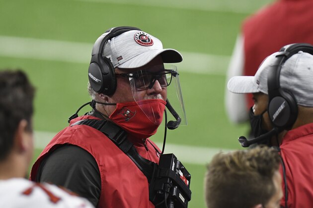 Tampa Bay Buccaneers head coach Bruce Arians talks to a coach during the second half of an NFL football game against the Detroit Lions, Saturday, Dec. 26, 2020, in Detroit. (AP Photo/Lon Horwedel) Tampa Bay Buccaneers head coach Bruce Arians talks to a coach during the second half of an NFL football game against the Detroit Lions, Saturday, Dec. 26, 2020, in Detroit. (AP Photo/Lon Horwedel)