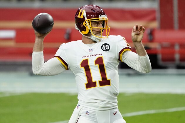 Washington Football Team quarterback Alex Smith (11) warms up prior to an NFL football game against San Francisco 49ers, Sunday, Dec. 13, 2020, in Glendale, Ariz. (AP Photo/Rick Scuteri)