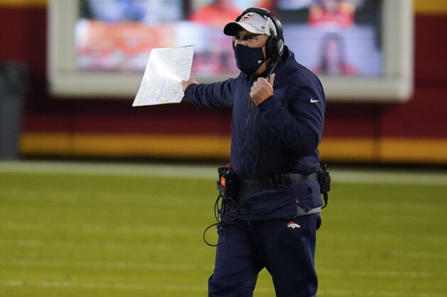 Denver Broncos head coach Vic Fangio discuss a call in the first half of an NFL football game against the Kansas City Chiefs in Kansas City, Mo., Sunday, Dec. 6, 2020. (AP Photo/Jeff Roberson)
