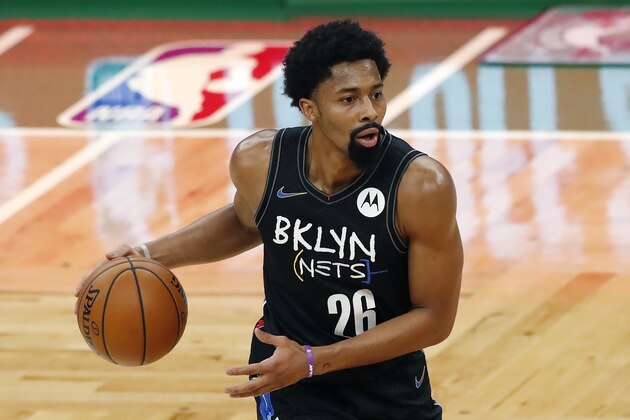 Brooklyn Nets' Spencer Dinwiddie plays against the Boston Celtics during the first half of an NBA basketball game, Friday, Dec. 25, 2020, in Boston. (AP Photo/Michael Dwyer)