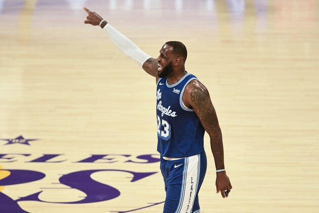 Los Angeles Lakers forward LeBron James yells instructions to his teammates during the first half of an NBA basketball game against the Minnesota Timberwolves in Los Angeles, Sunday, Dec. 27, 2020. (AP Photo/Kyusung Gong)