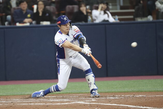 South Korea's Kim Ha-seong hits an RBI double off Cuba's pitcher Yariel Rodriguez during the second inning of the Group C of the WBSC Premier12 2019 world baseball tournament against Canada at Gocheok Sky Dome in Seoul, South Korea, Friday, Nov. 8, 2019. (AP Photo/Ahn Young-joon)