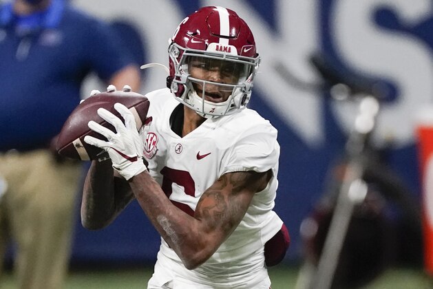 Alabama wide receiver DeVonta Smith (6) runs against Florida during the first half of the Southeastern Conference championship NCAA college football game, Saturday, Dec. 19, 2020, in Atlanta. (AP Photo/John Bazemore)