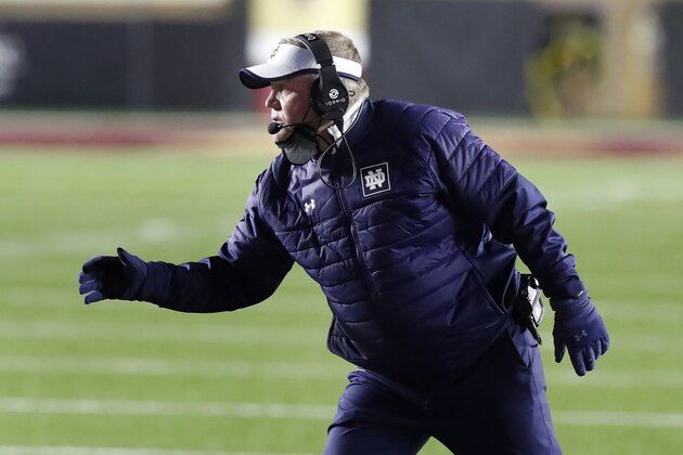 Notre Dame head coach Brian Kelly on the field during the first half of an NCAA college football game against Boston College, Saturday, Nov. 14, 2020, in Boston. (AP Photo/Michael Dwyer)
