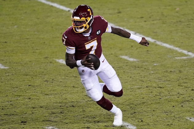 Washington Football Team quarterback Dwayne Haskins scrambles during an NFL football game against the Carolina Panthers, Sunday, Dec. 27, 2020, in Landover, Md. (AP Photo/Mark Tenally)