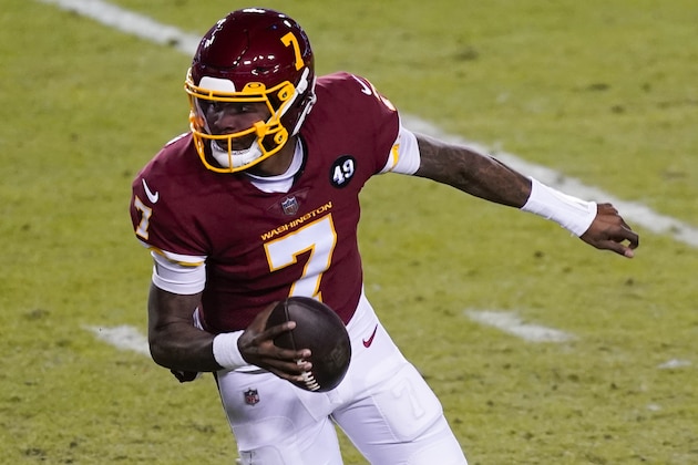 Washington Football Team quarterback Dwayne Haskins (7) runs with the ball during the first half of an NFL football game against the Carolina Panthers, Sunday, Dec. 27, 2020, in Landover, Md. (AP Photo/Mark Tenally)