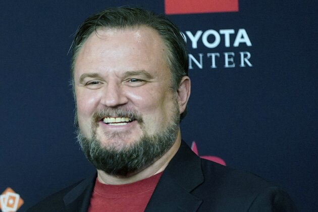 FILE - This is a July 26, 2019, file photo showing Houston Rockets General Manager Daryl Morey during an NBA basketball news conference, in Houston. Rockets general manager Daryl Morey is stepping down on his own accord, a person familiar with the decision told The Associated Press. The person spoke on condition of anonymity Thursday, Oct. 15, 2020, because the move hasnâ€™t been announced.(AP Photo/David J. Phillip)