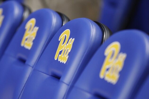 The Pitt logo is displayed on team seats before an NCAA college exhibition basketball game between Pittsburgh and Slippery Rock, Wednesday, Oct. 30, 2019, in Pittsburgh. The Petersen Events Center under went renovations in the off season that included flipping the team positions on the court, LED lighting throughout the entire building, two end zone replay/stats boards, and various media and guest seating changes. (AP Photo/Keith Srakocic)