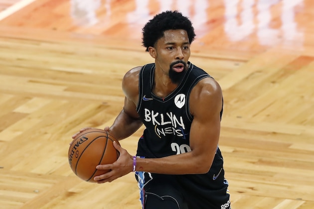Brooklyn Nets' Spencer Dinwiddie plays against the Boston Celtics during the first half of an NBA basketball game, Friday, Dec. 25, 2020, in Boston. (AP Photo/Michael Dwyer)