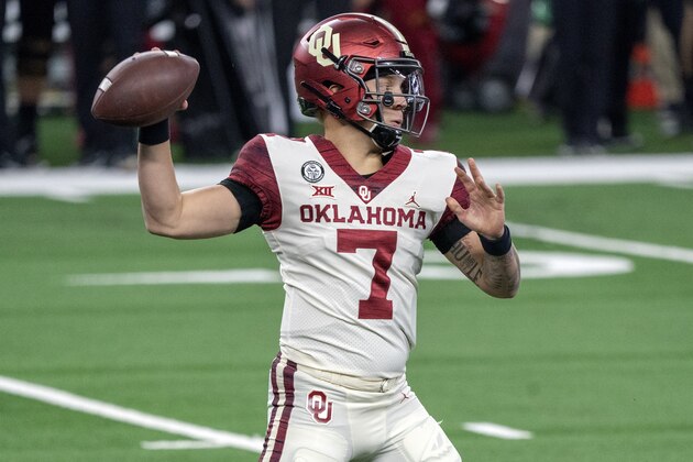 Oklahoma quarterback Spencer Rattler (7) throws against Iowa State during the first half of the the Big 12 Conference championship NCAA college football game, Saturday, Dec. 19, 2020, in Arlington, Texas. (AP Photo/Jeffrey McWhorter)