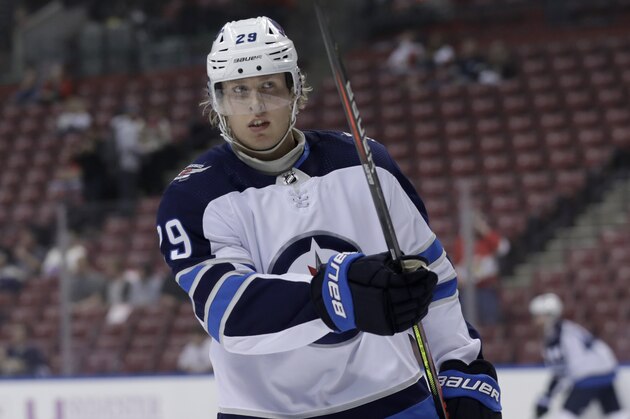 Winnipeg Jets right wing Patrik Laine (29) warms up before an NHL hockey game against the Florida Panthers, Thursday, Nov. 14, 2019, in Sunrise, Fla. (AP Photo/Lynne Sladky)