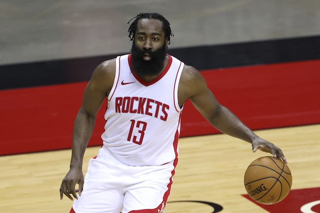 Houston Rockets' James Harden controls the ball during the first half of an NBA basketball game against the San Antonio Spurs in Houston, Thursday, Dec. 17, 2020. (Carmen Mandato/Pool Photo via AP)