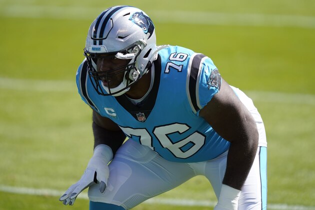 Carolina Panthers offensive tackle Russell Okung (76) warms up prior to an NFL football game against the Chicago Bears in Charlotte, N.C., Sunday, Oct. 18, 2020. (AP Photo/Brian Blanco)