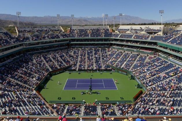 Mardy Fish and Bobby Reynolds play on Stadium Court during their match at the BNP Paribas Open tennis tournament on Sunday, March 10, 2013, in Indian Wells, Calif. (AP Photo/Mark J. Terrill)