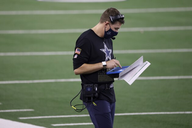 Dallas Cowboys offensive coordinator Kellen Moore stands on the sideline during the second half of an NFL football game against the Pittsburgh Steelers in Arlington, Texas, Sunday, Nov. 8, 2020. (AP Photo/Ron Jenkins)